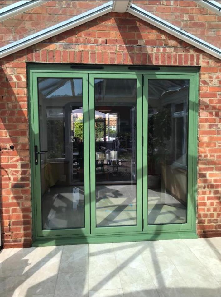 green aluminium bifold doors